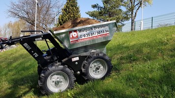 Muck Truck auf Böschung